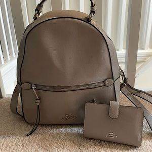 Coach backpack with matching wallet. Grey in color
